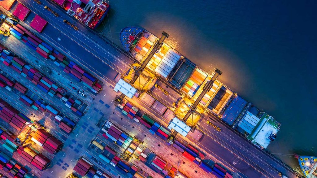 Overhead view of container ship at trade port