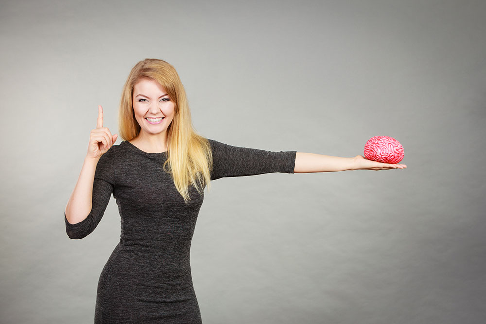 Woman holding brain